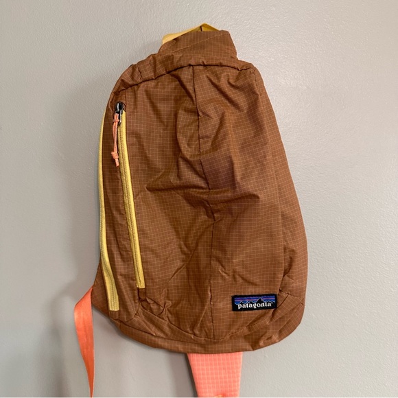 Patagonia Handbags - Patagonia 8L Ultralight Black Hole Sling in Tigerlily Orange